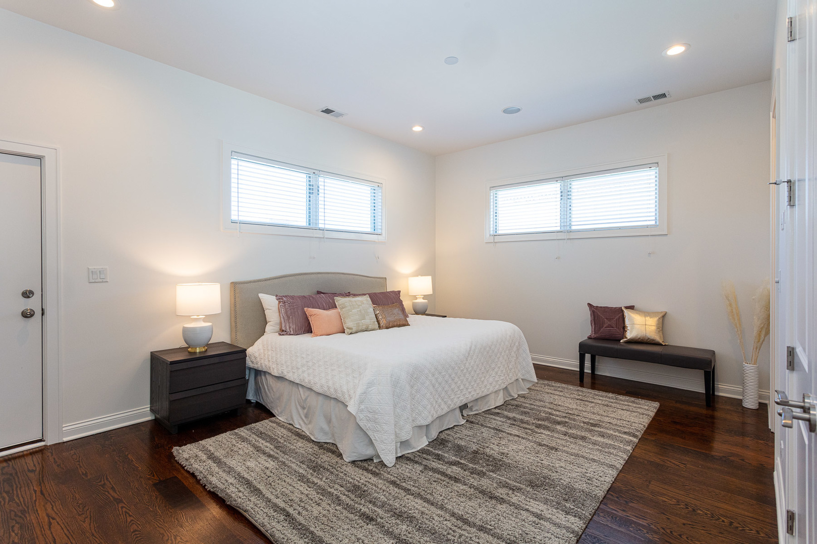 1838 West Rice Street, Unit 3 Chicago, IL 60622 - Photo 18 of 29 a bedroom with a bed and a chair