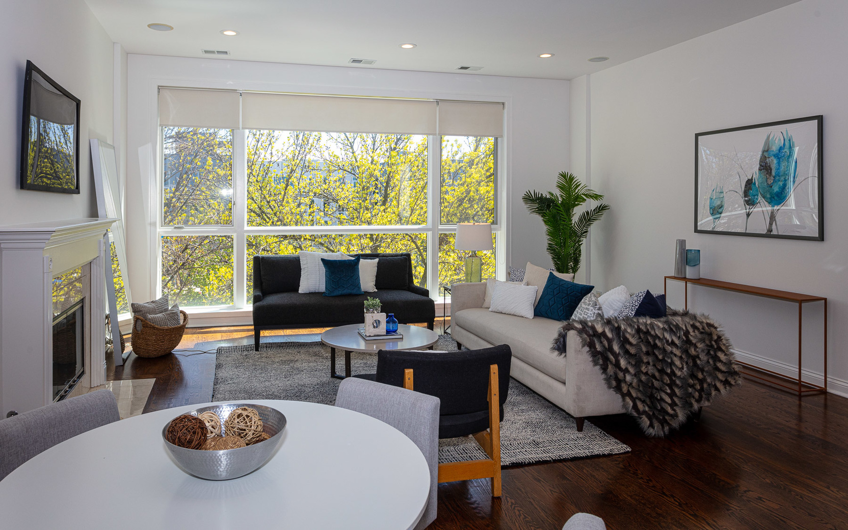 1838 West Rice Street, Unit 3 Chicago, IL 60622 - Photo 3 of 29 a living room with furniture a flat screen tv and a large window
