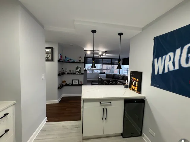 a kitchen with stainless steel appliances granite countertop a stove and a sink