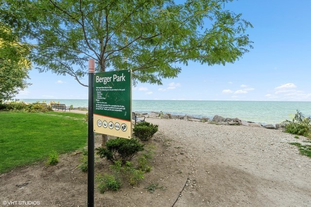6171 North Sheridan Road, Unit 1102 Chicago, IL 60660 - Photo 5 of 39 a view of a lake with a yard