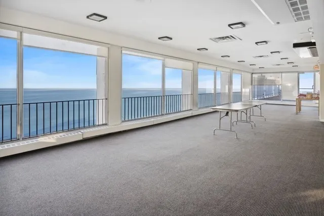 a living room with gym equipment