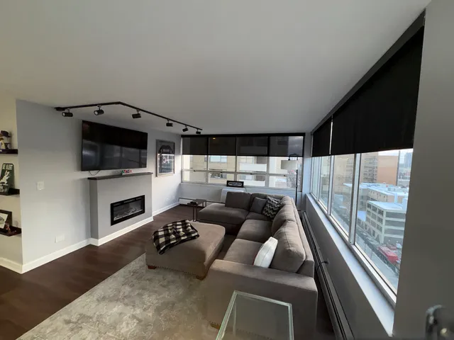 a living room with furniture and a window