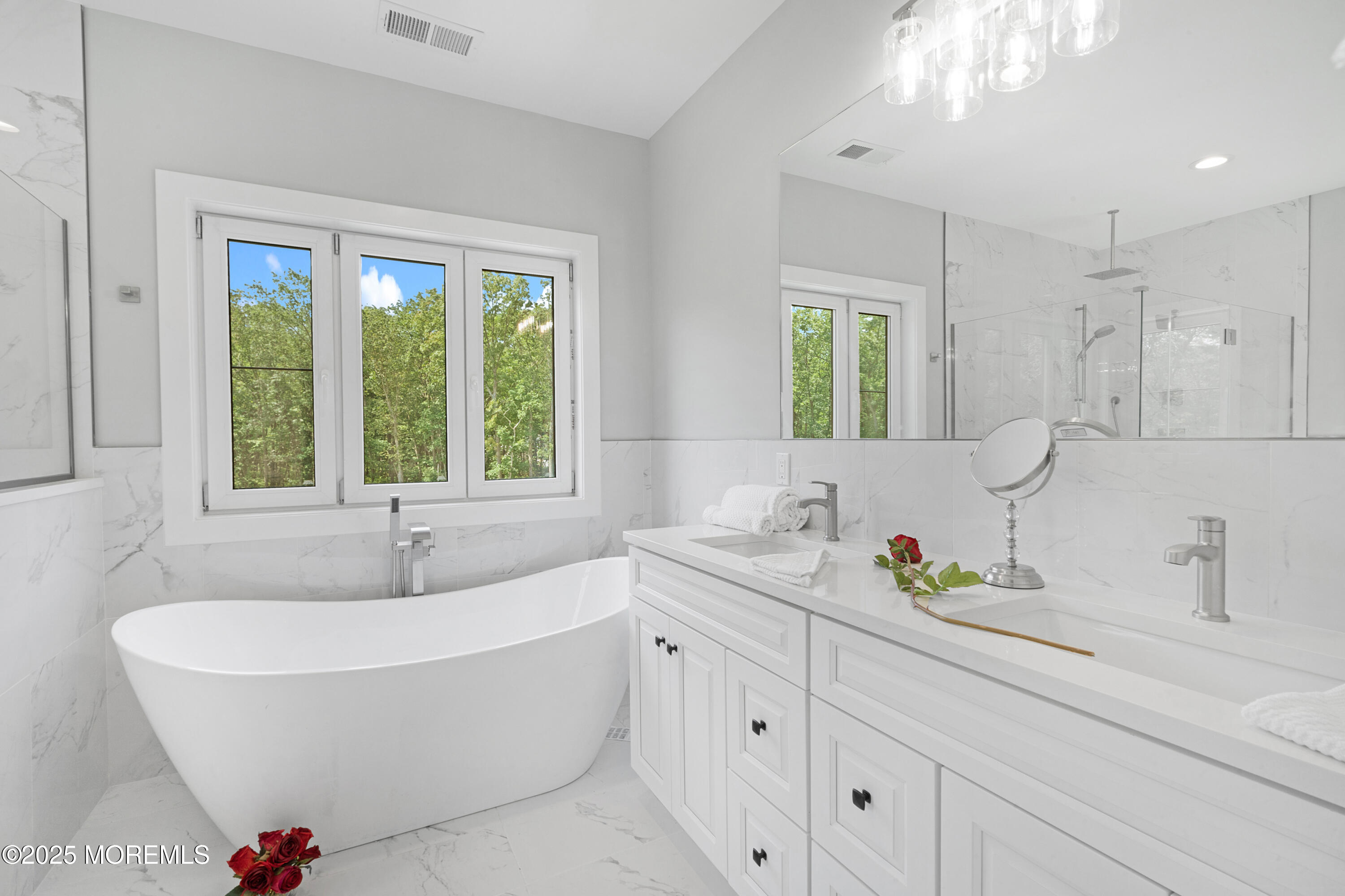 8 Haystack Court Howell, NJ 07731 - Photo 29 of 40 a bathroom with sink bathtub and window