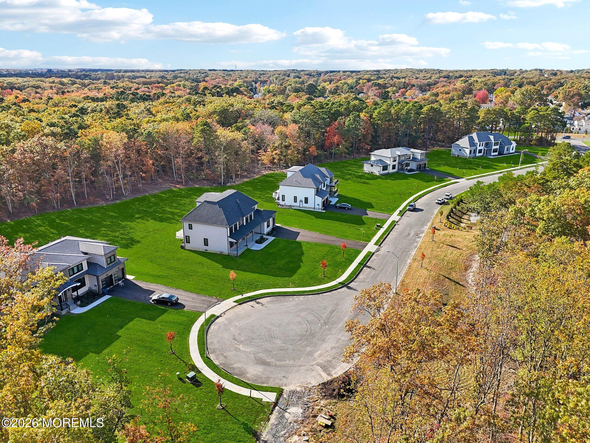 8 Haystack Court Howell, NJ 07731 - Photo 3 of 40 an aerial view of a house
