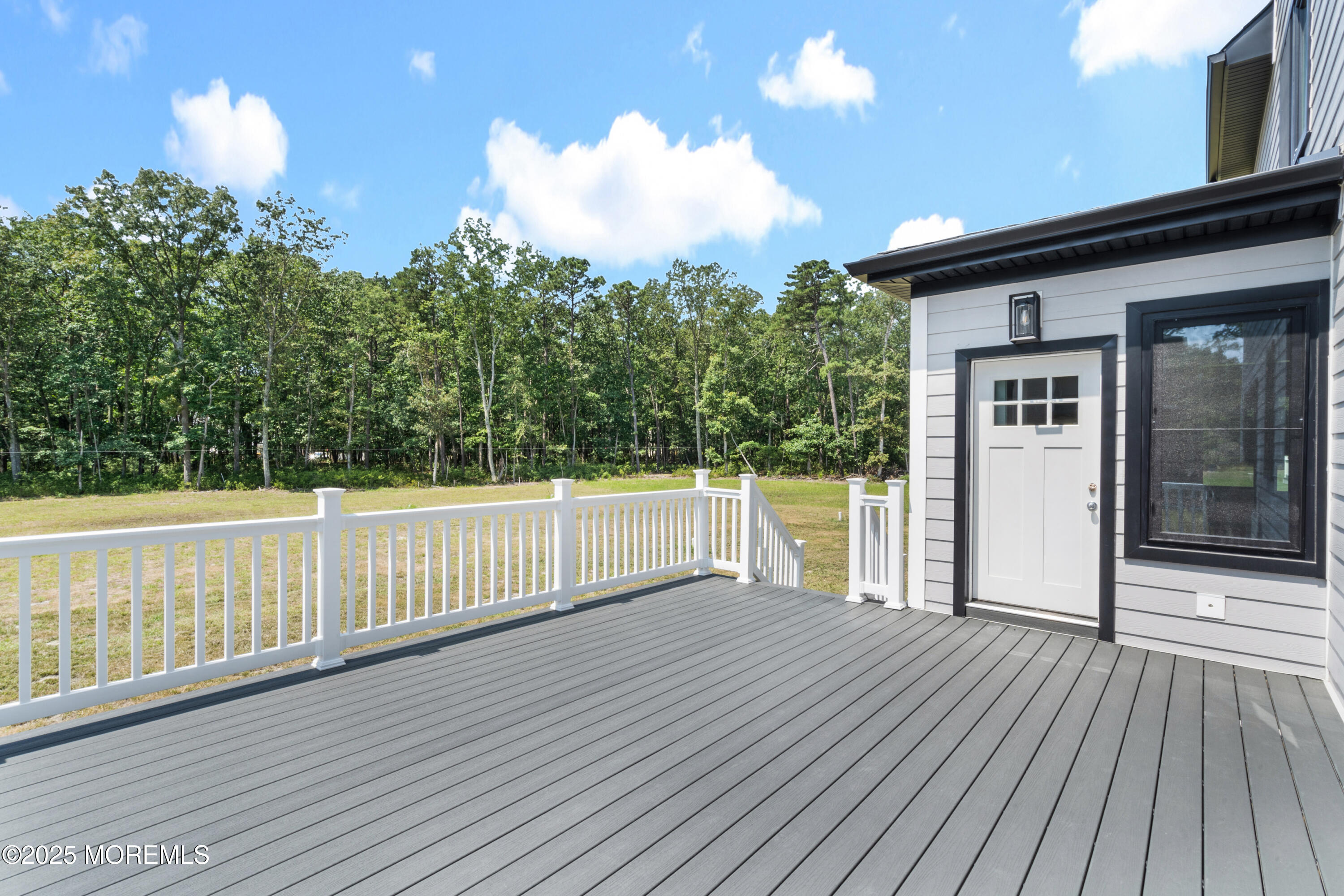 8 Haystack Court Howell, NJ 07731 - Photo 37 of 40 a view of a balcony with wooden floor