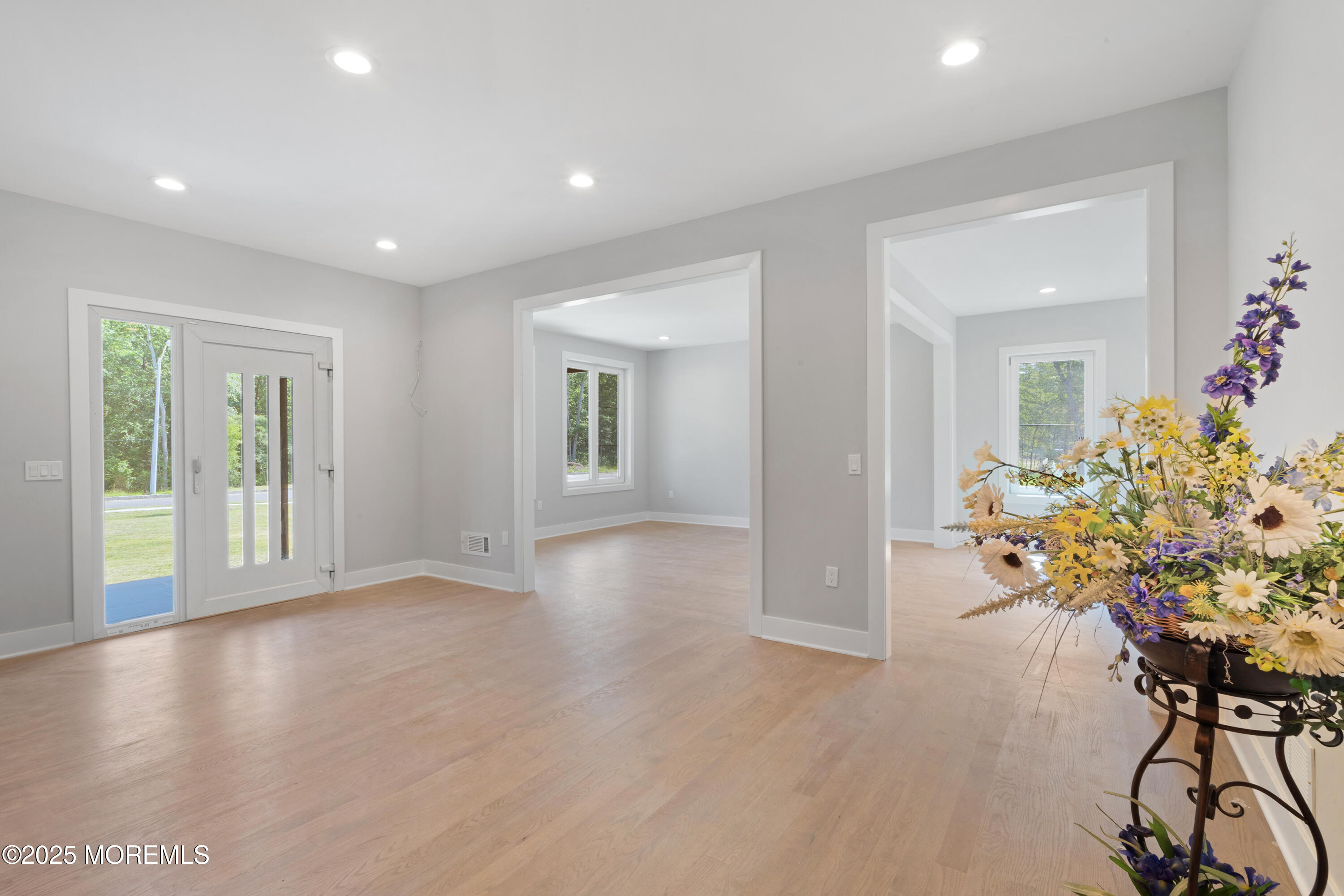 8 Haystack Court Howell, NJ 07731 - Photo 6 of 40 a view of livingroom with furniture window and wooden floor