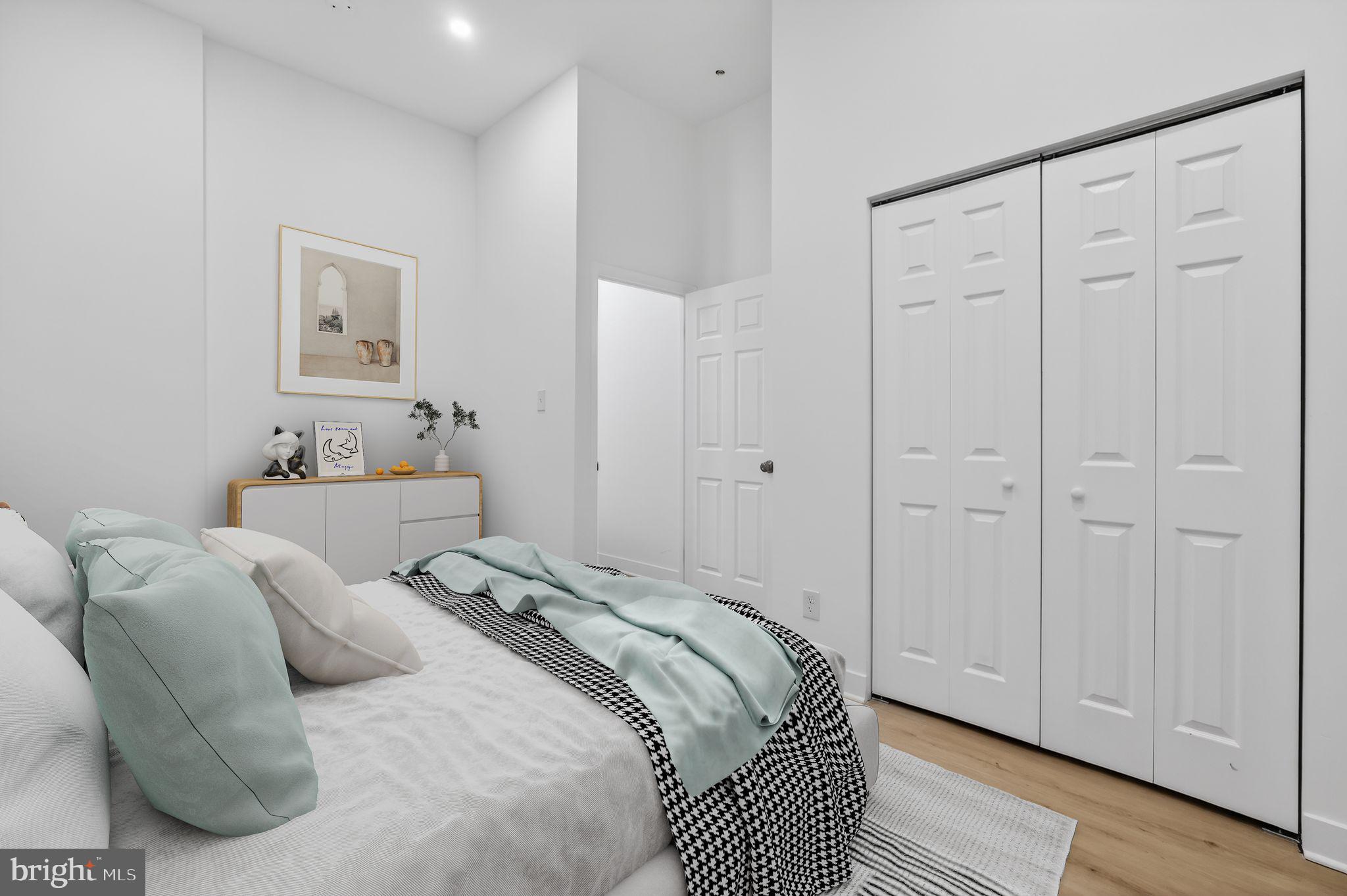 1415 Chapin Street Northwest, Unit 108 Washington, DC 20009 - Photo 6 of 12 a bedroom with a bed and a window