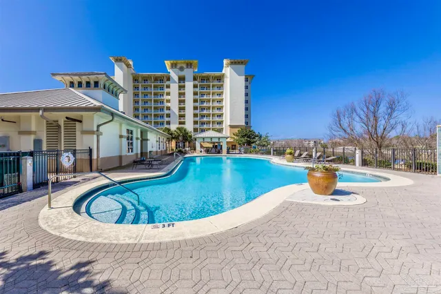 a view of a house with swimming pool