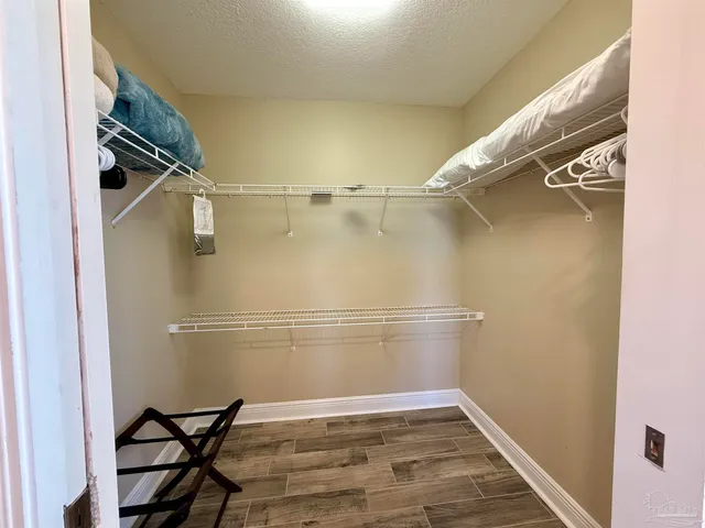 a view of a room with racks on the wall