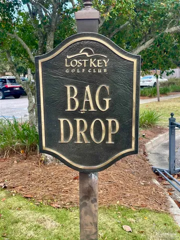 a view of a golf course with a lake