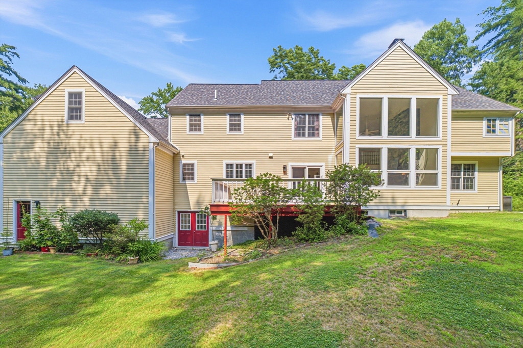 85 Cedarwood Road Boxborough, MA 01719 - Photo 39 of 41 a view of a house with a yard