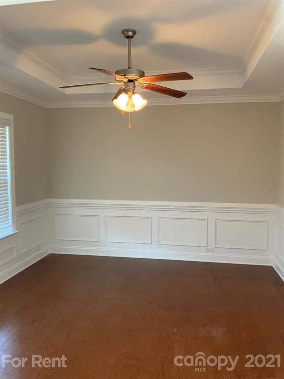 3028 Fallondale Road, Unit 894 Waxhaw, NC 28173 - Photo 3 of 27 a view of room with hardwood floor and ceiling fan