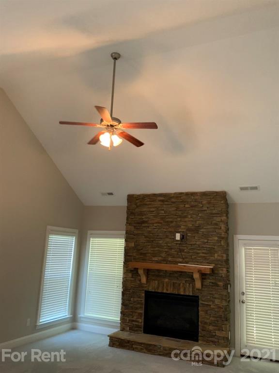 3028 Fallondale Road, Unit 894 Waxhaw, NC 28173 - Photo 9 of 27 a living room with a fireplace