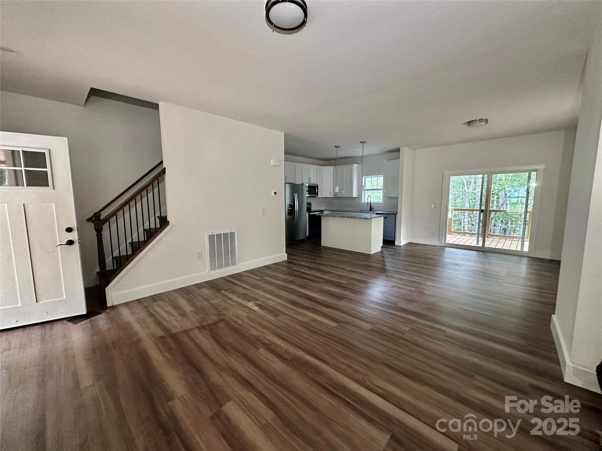206 Cascade Rdg Road Fairview, NC 28730 - Photo 14 of 38 a view of a livingroom with wooden floor