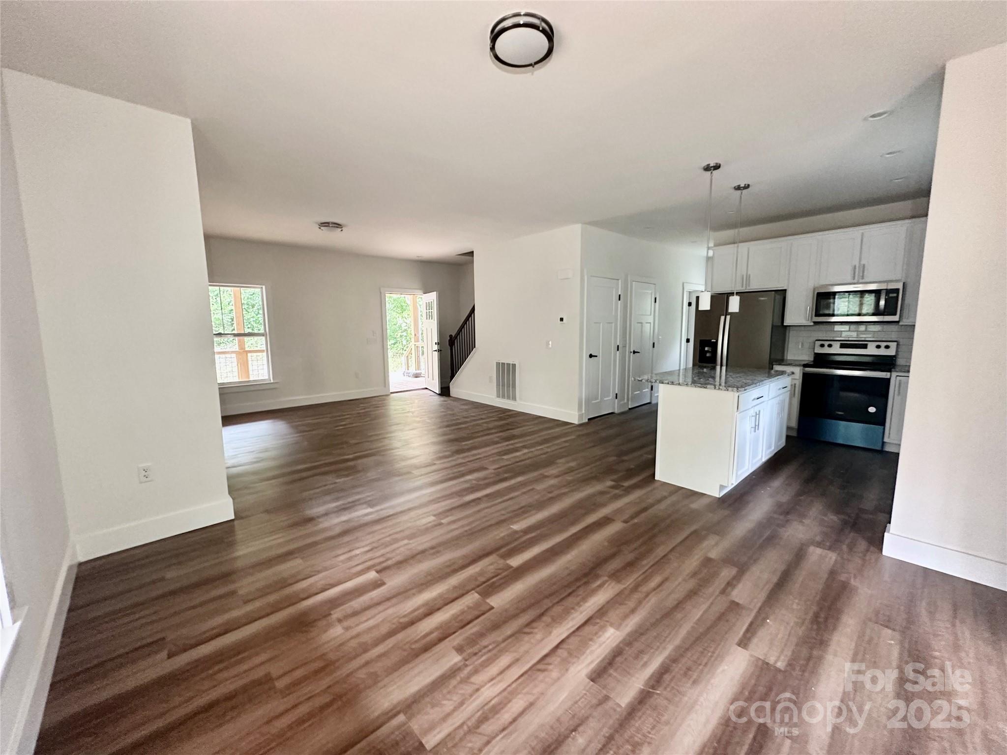 206 Cascade Rdg Road Fairview, NC 28730 - Photo 15 of 38 a view of a kitchen with microwave and cabinets