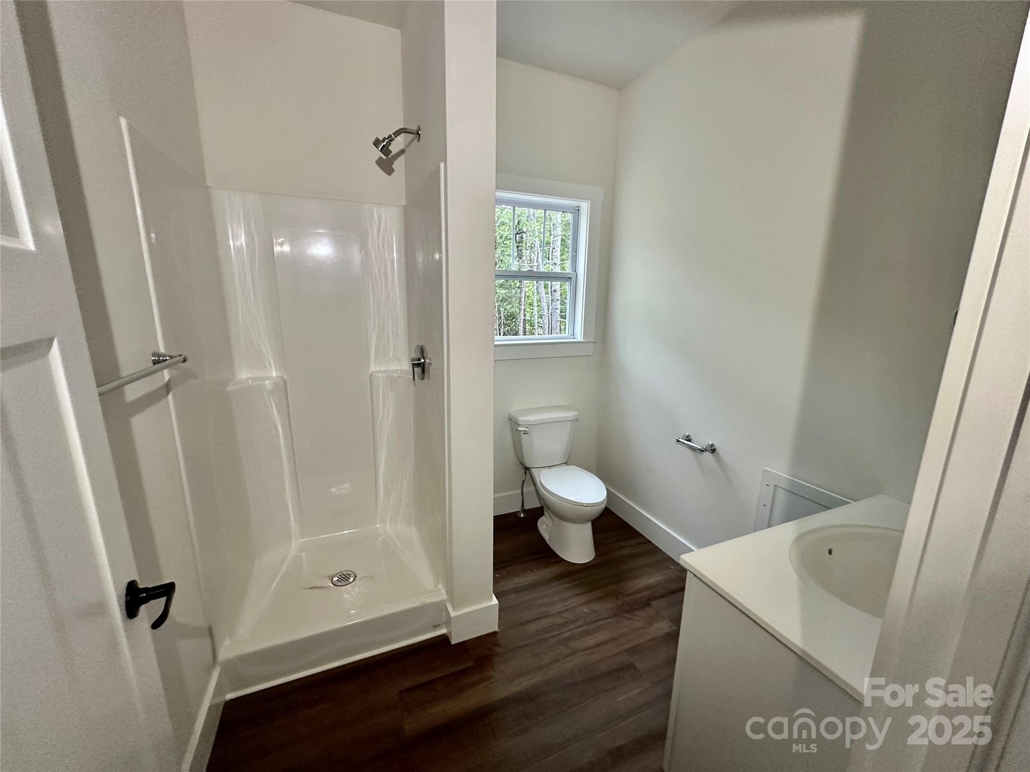 206 Cascade Rdg Road Fairview, NC 28730 - Photo 21 of 38 a bathroom with a sink and a toilet