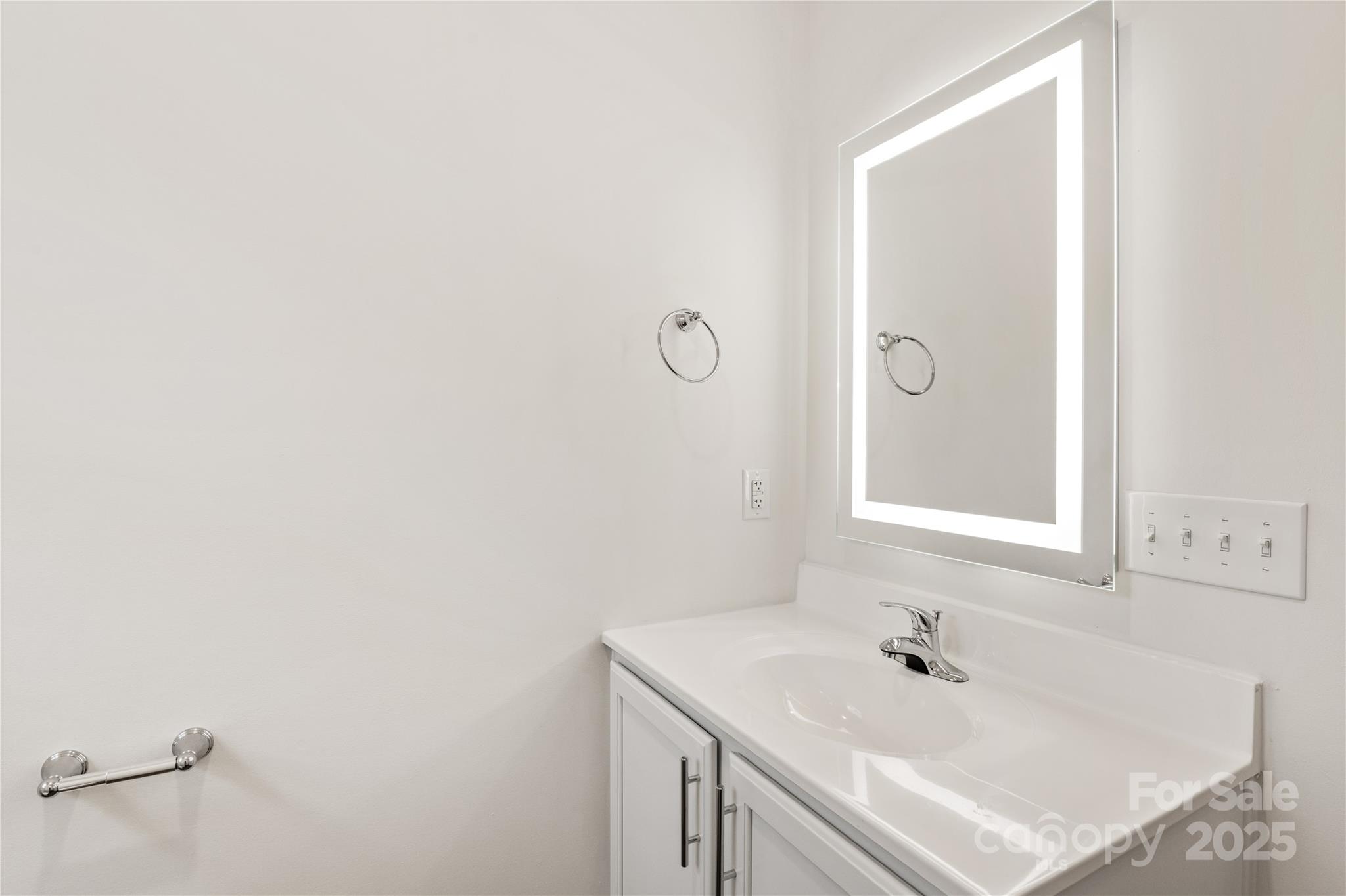 206 Cascade Rdg Road Fairview, NC 28730 - Photo 31 of 38 a bathroom with a sink and a mirror