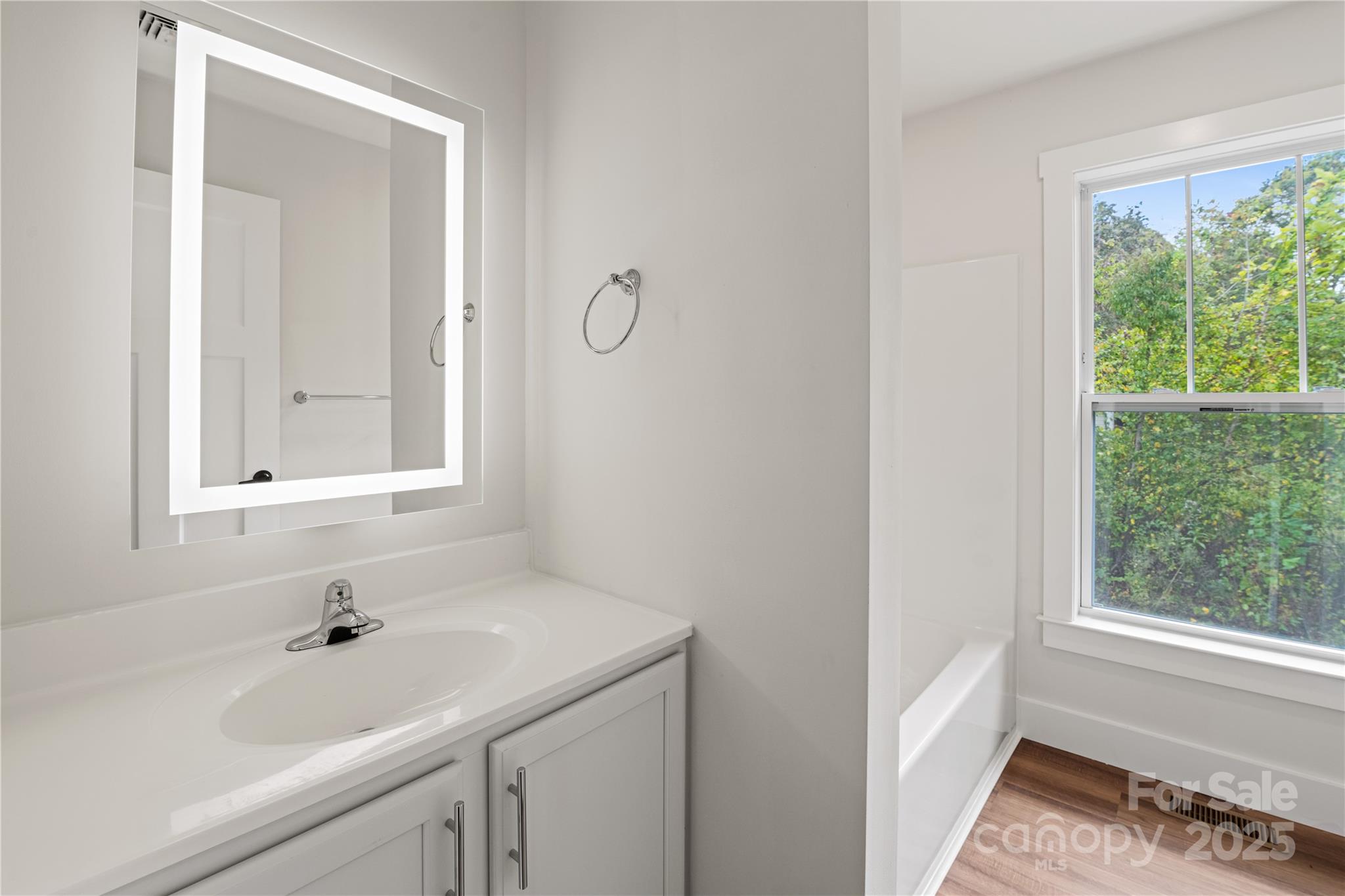 206 Cascade Rdg Road Fairview, NC 28730 - Photo 33 of 38 a bathroom with a sink and a window