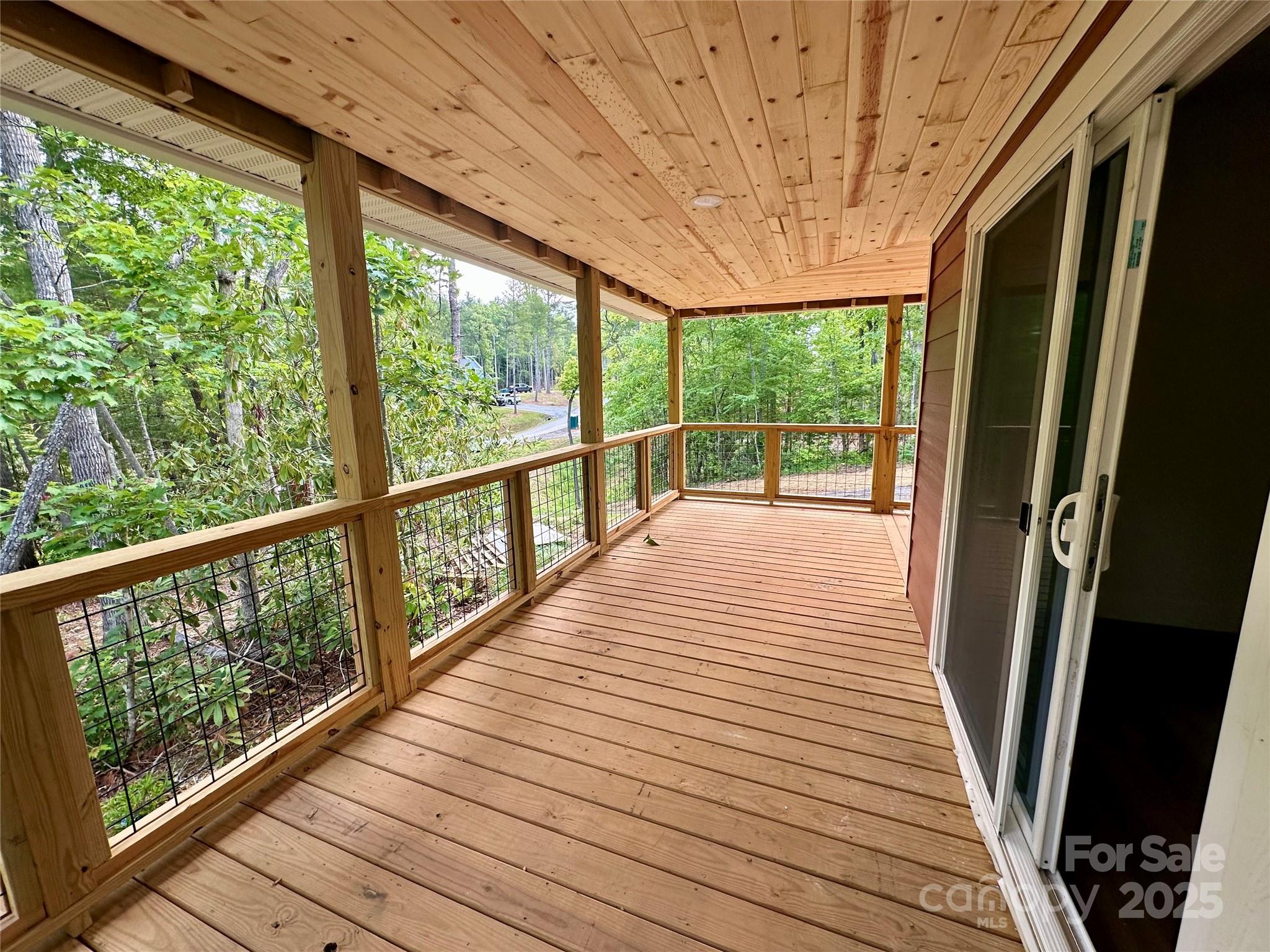 206 Cascade Rdg Road Fairview, NC 28730 - Photo 35 of 38 a view of a balcony with wooden floor