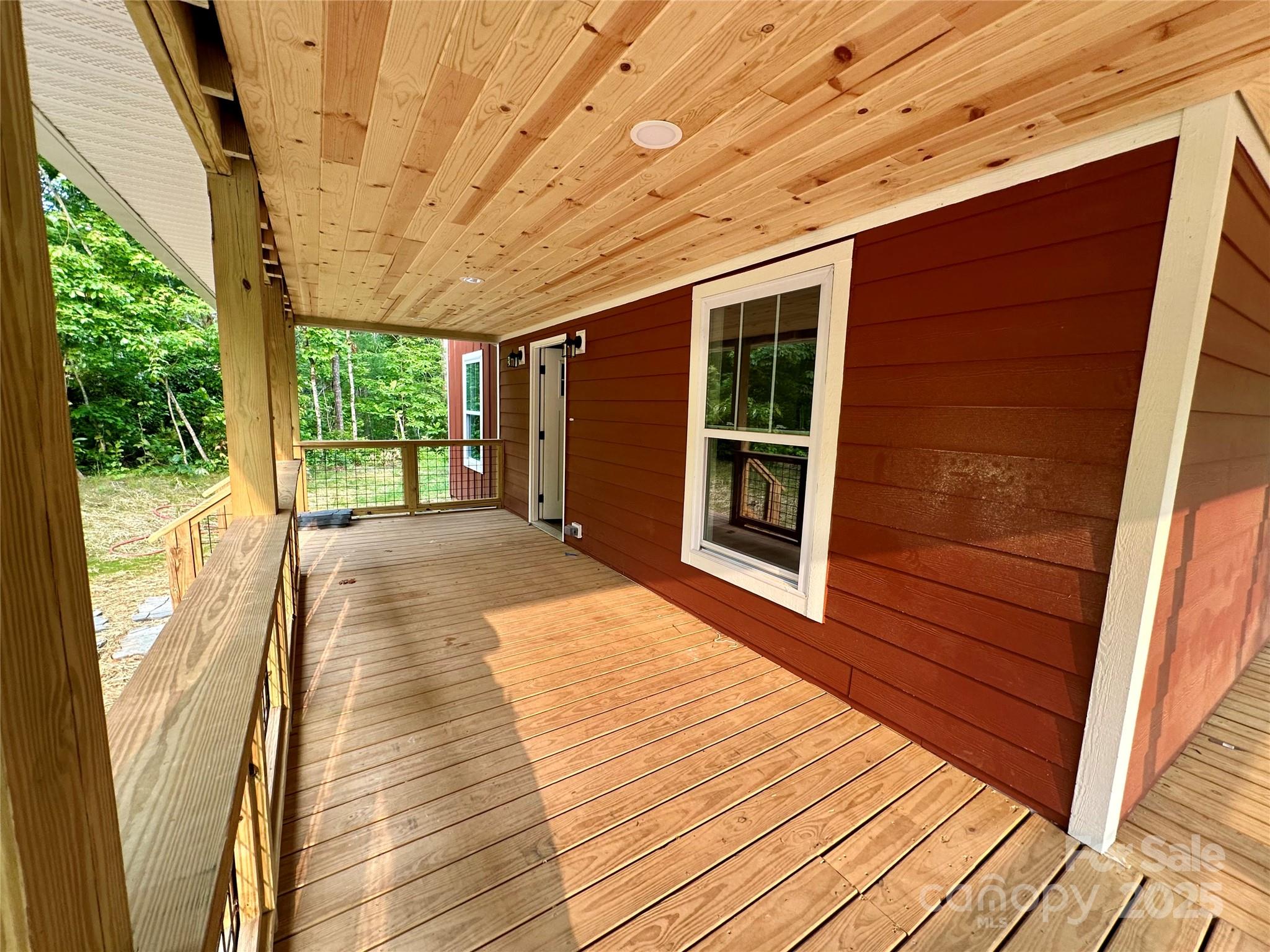 206 Cascade Rdg Road Fairview, NC 28730 - Photo 4 of 38 a balcony with wooden floor