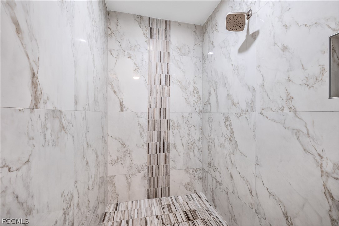 3209 West Riverside Drive Fort Myers, FL 33901 - Photo 21 of 31 a bathroom with a shower