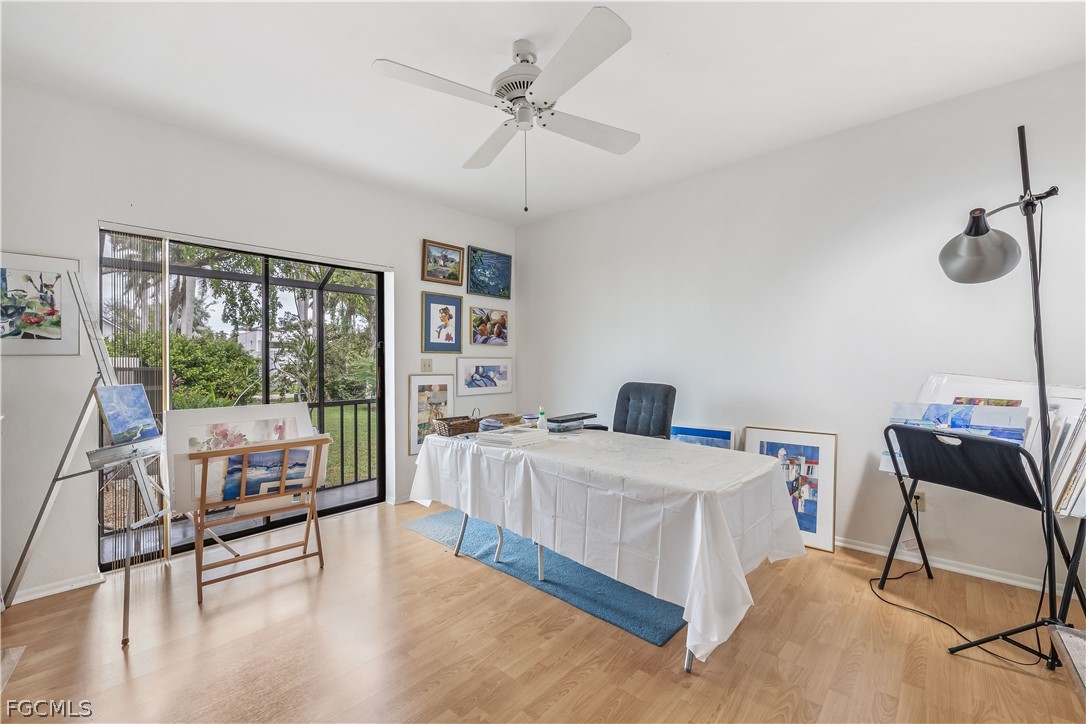 3209 West Riverside Drive Fort Myers, FL 33901 - Photo 26 of 31 a bedroom with a bed and a table