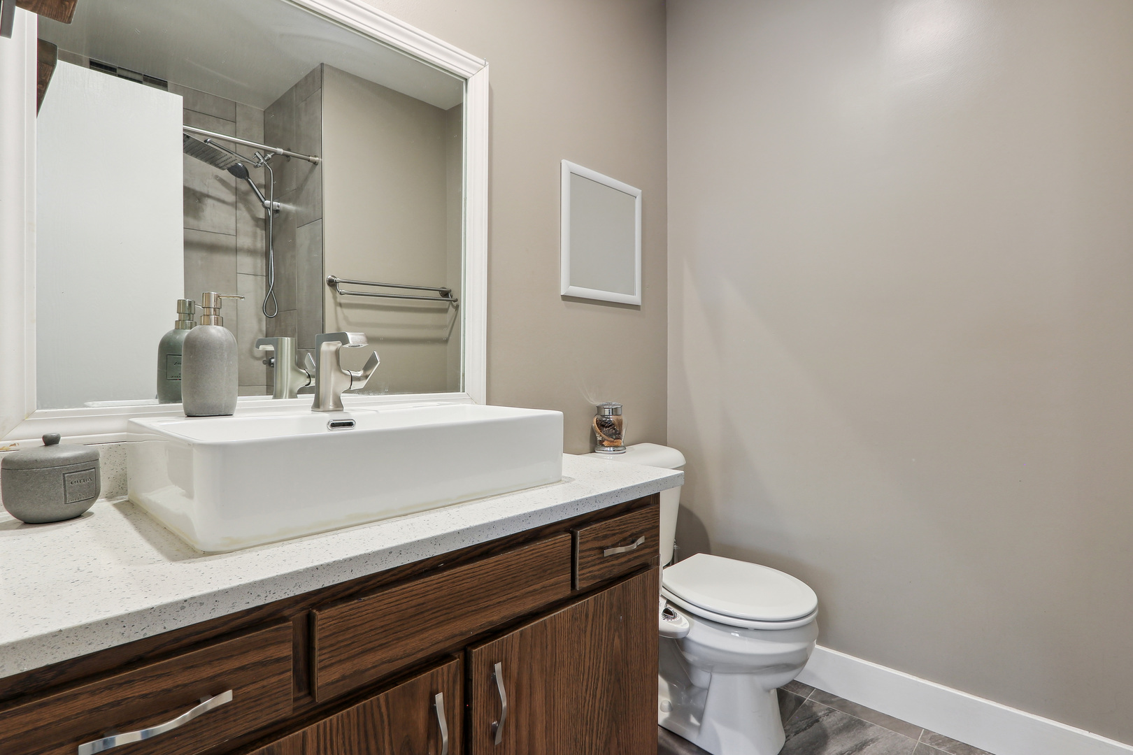 2143 Harbor Town Circle Champaign, IL 61821 - Photo 18 of 29 a bathroom with a sink a toilet and mirror