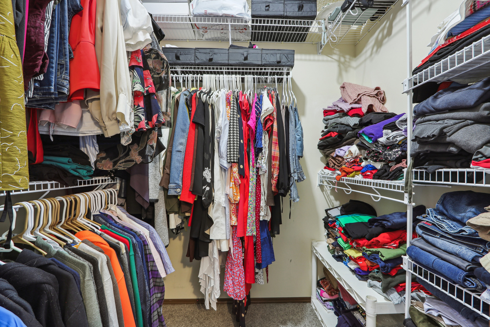 2143 Harbor Town Circle Champaign, IL 61821 - Photo 19 of 29 a view of walk in closet with clothes