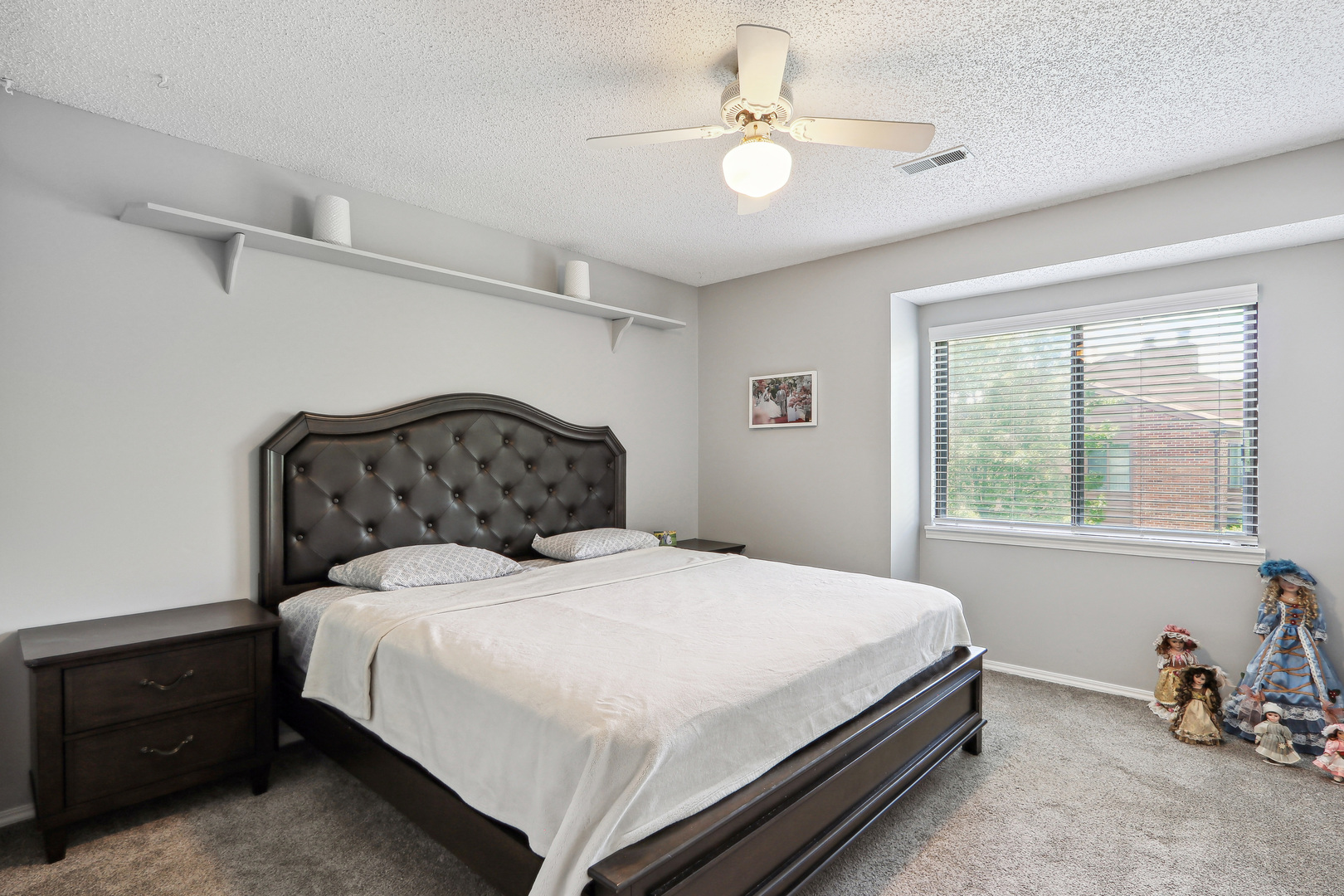 2143 Harbor Town Circle Champaign, IL 61821 - Photo 20 of 29 a bedroom with a bed and a chair