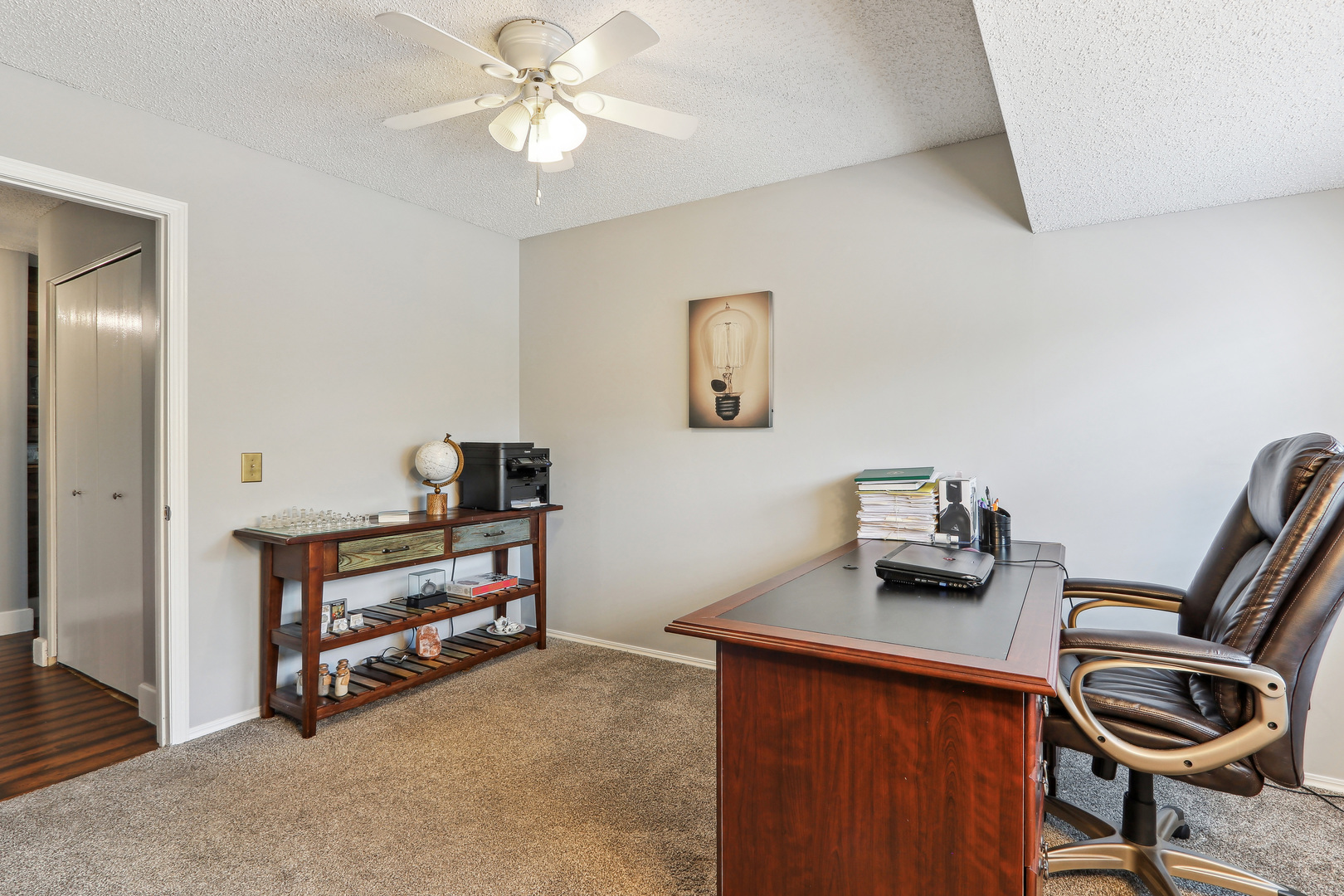 2143 Harbor Town Circle Champaign, IL 61821 - Photo 23 of 29 a view of a workspace with furniture and a window