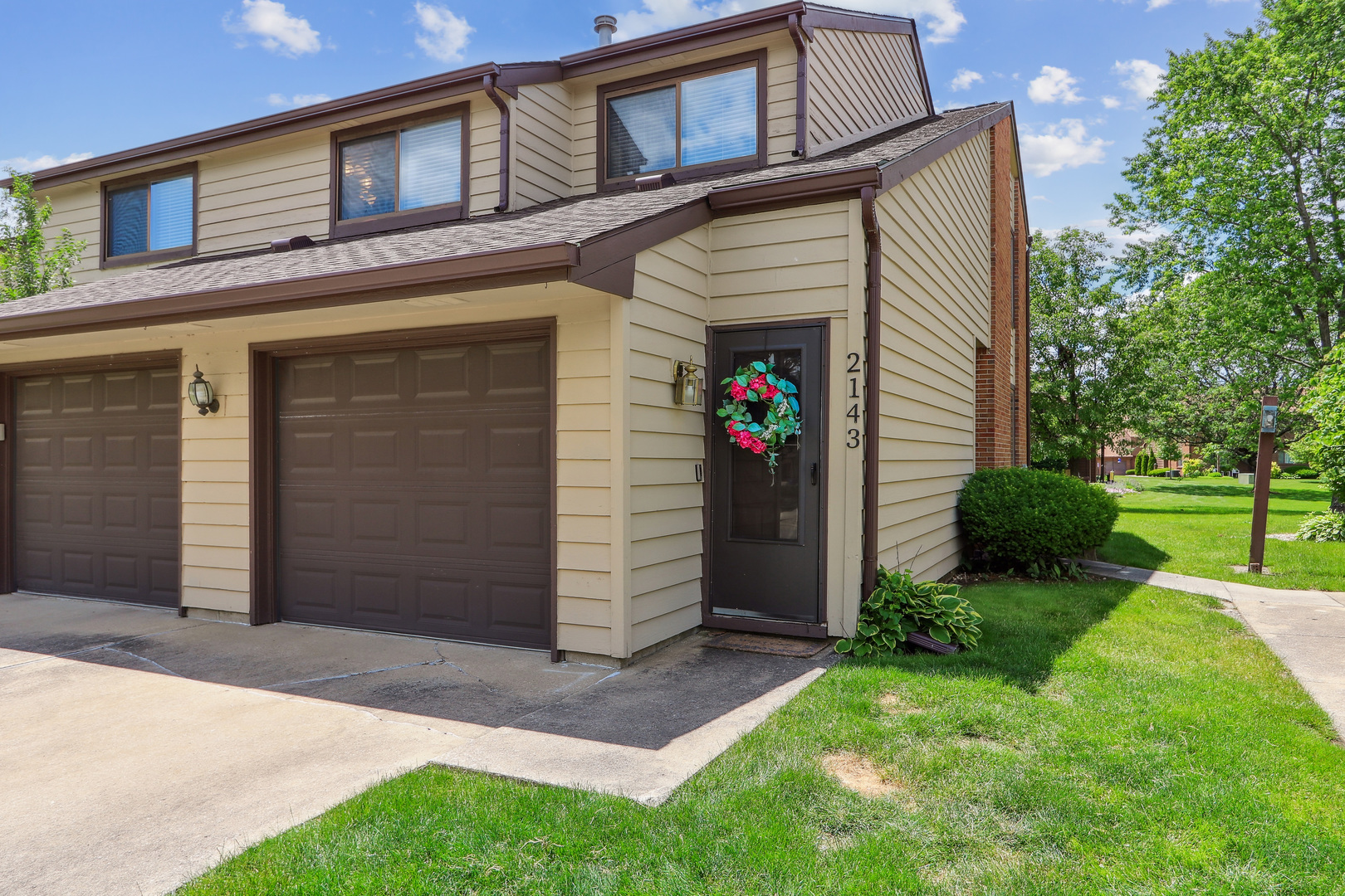 2143 Harbor Town Circle Champaign, IL 61821 - Photo 4 of 29 a view of a house with a yard