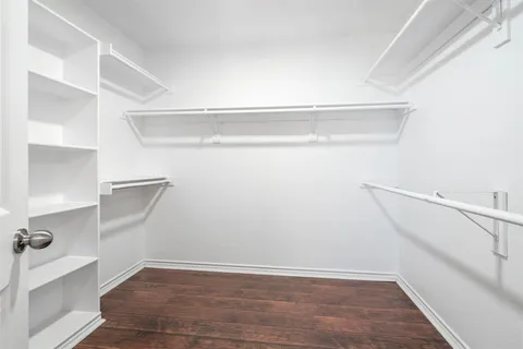 a view of an empty walk in closet