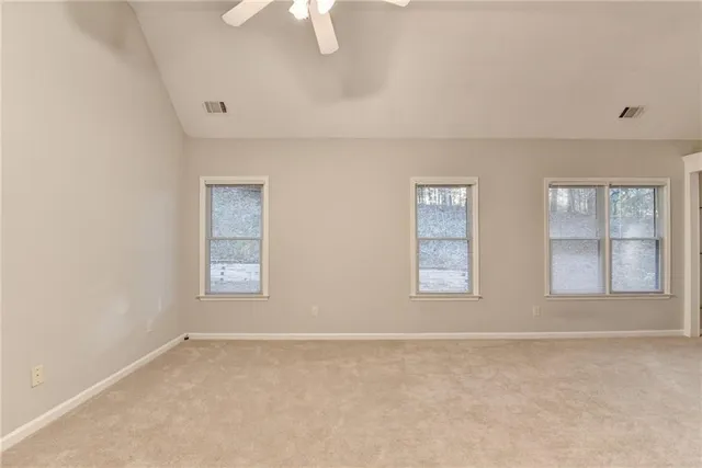 a bedroom with a bed and furniture