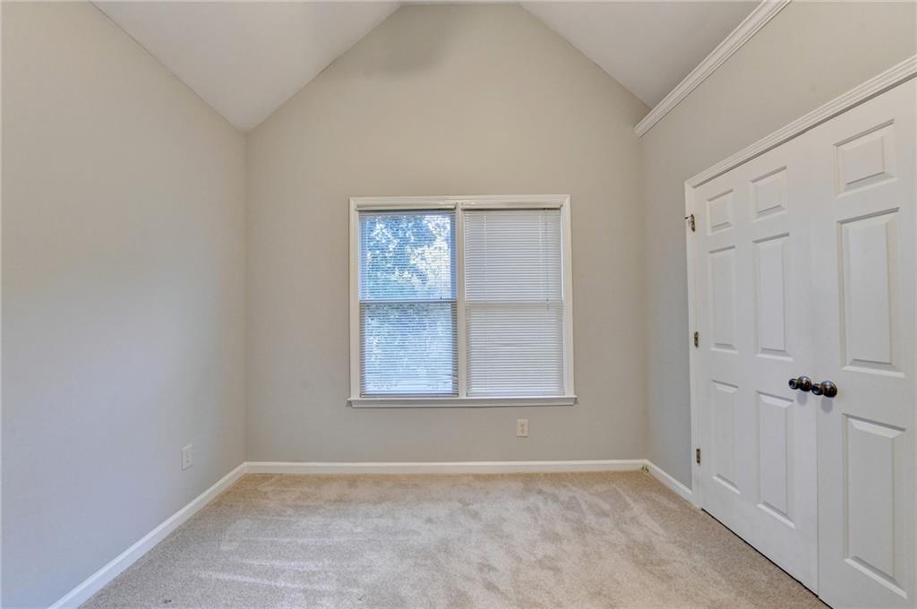 655 Golden Meadows Lane Suwanee, GA 30024 - Photo 39 of 72 an empty room with windows