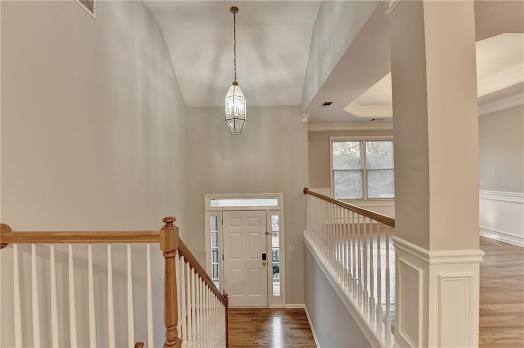 655 Golden Meadows Lane Suwanee, GA 30024 - Photo 5 of 72 a view of a hallway with windows