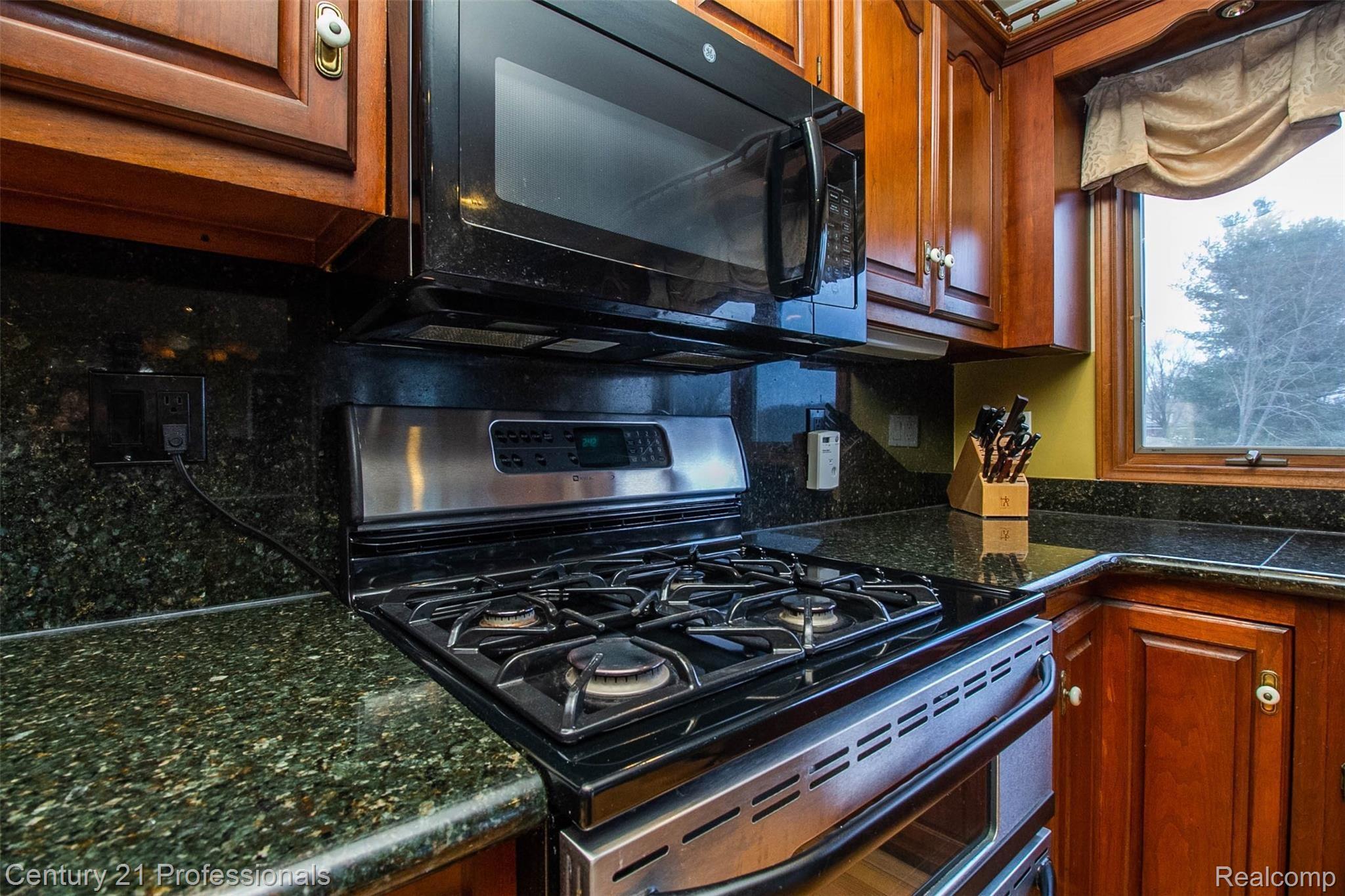 69401 Eldred Road Romeo, MI 48065 - Photo 18 of 65 second view of gas stove in main kitchen