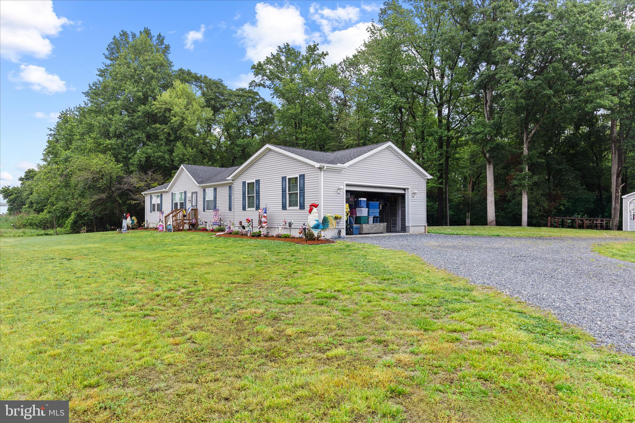 21933 Conrail Road Seaford, DE 19973 - Photo 2 of 35 a view of house that has a yard