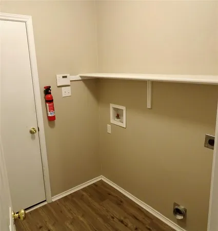 a view of small space with racks on the wall