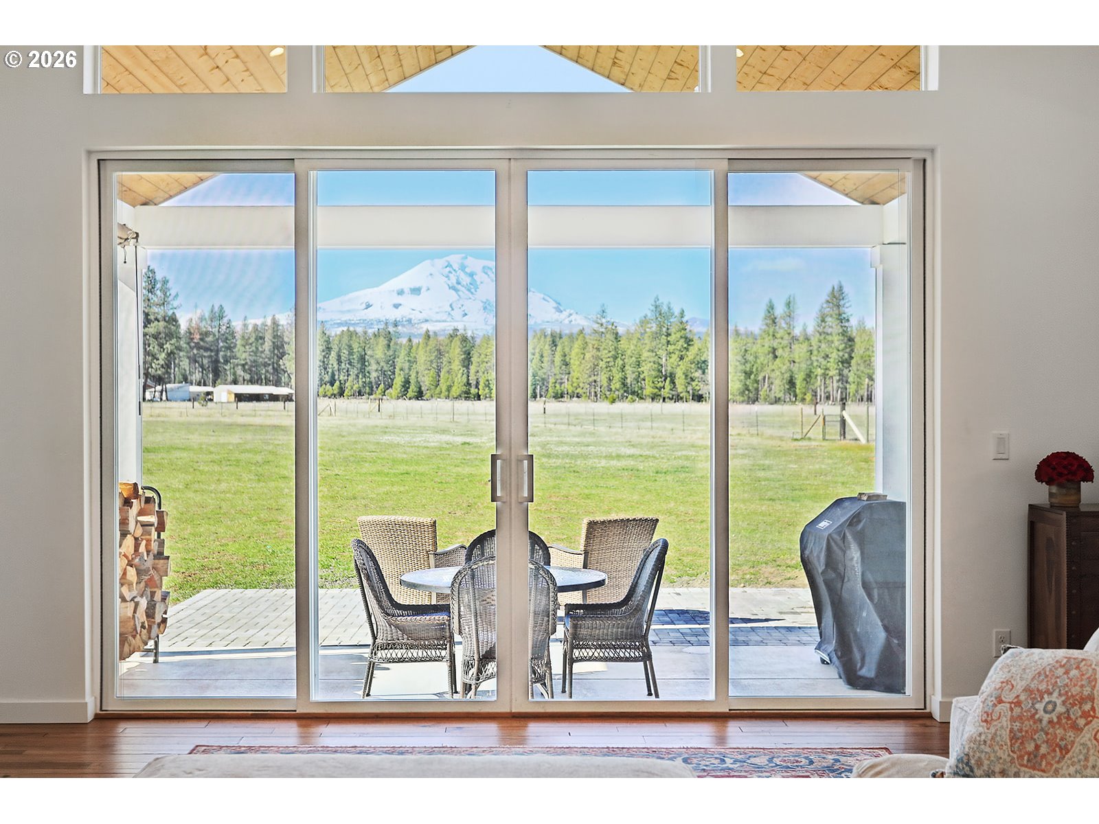 24 Bacon Creek Road Glenwood, WA 98619 - Photo 12 of 48 a view of a living room and floor to ceiling window