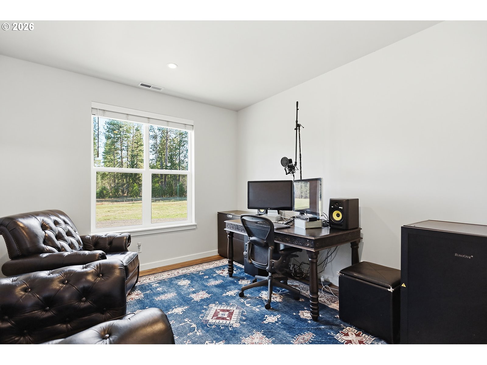 24 Bacon Creek Road Glenwood, WA 98619 - Photo 30 of 48 a living room with furniture rug and a window