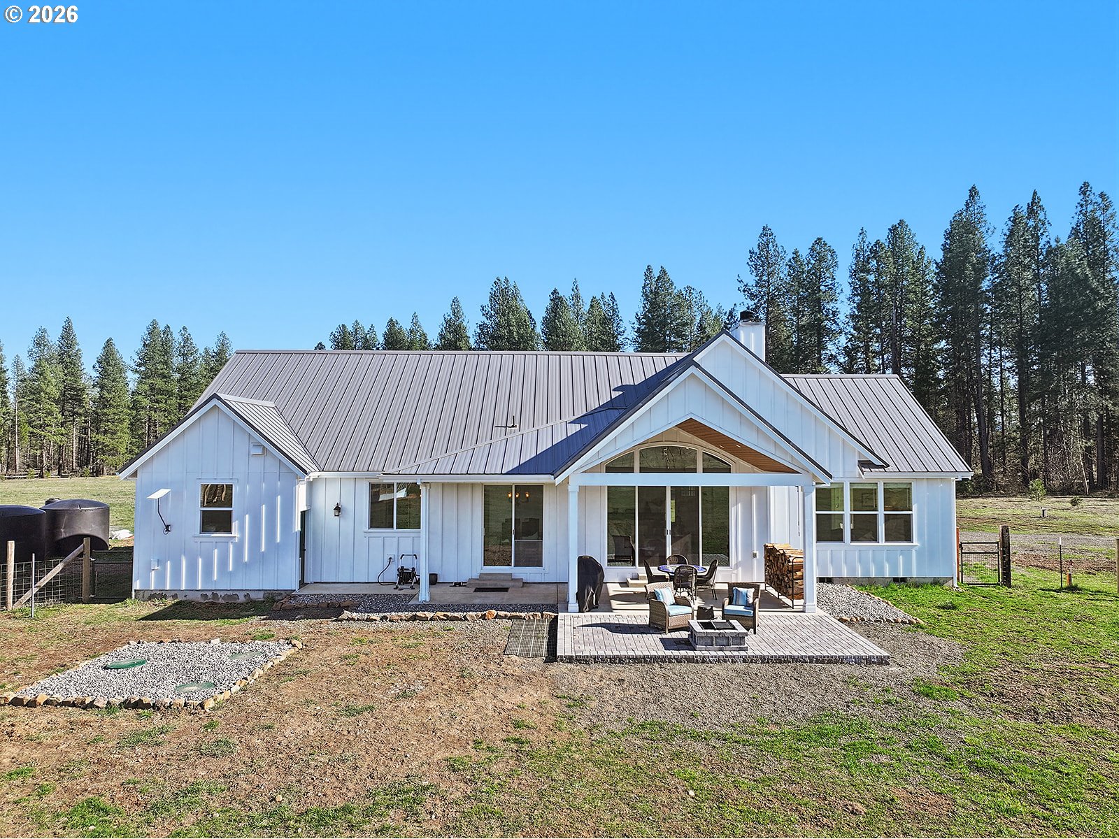24 Bacon Creek Road Glenwood, WA 98619 - Photo 3 of 48 a front view of a house with garden