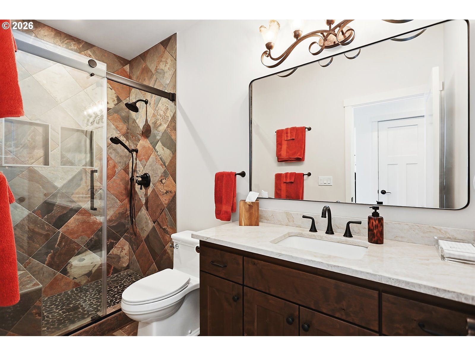 24 Bacon Creek Road Glenwood, WA 98619 - Photo 32 of 48 a bathroom with a sink vanity mirror and toilet