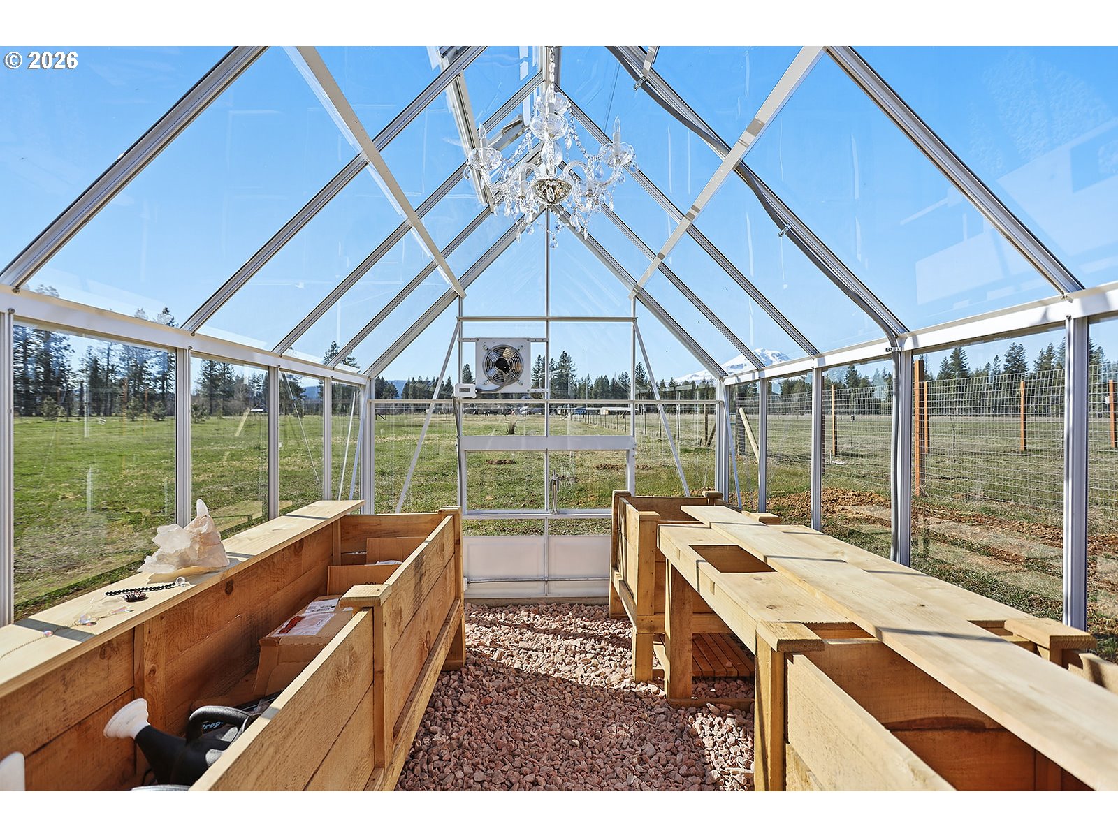 24 Bacon Creek Road Glenwood, WA 98619 - Photo 36 of 48 a view of a patio with a table and chairs
