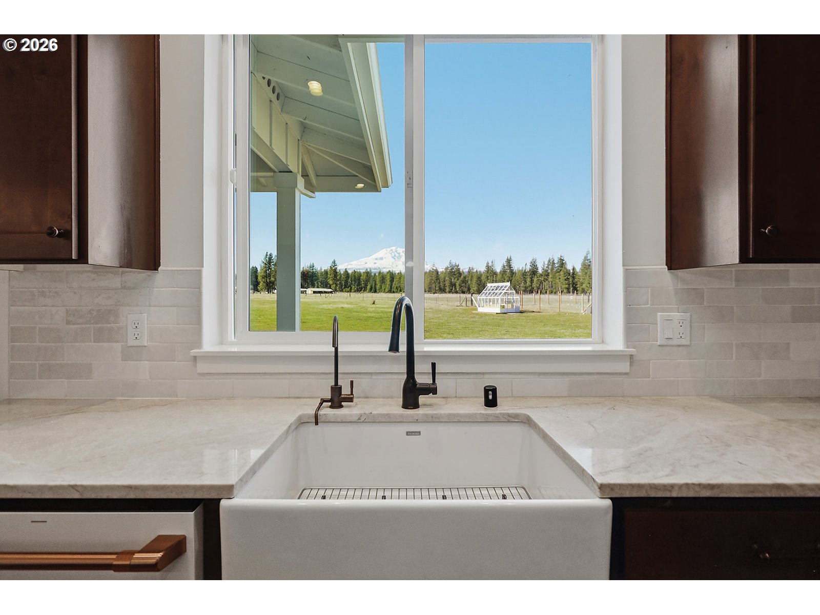 24 Bacon Creek Road Glenwood, WA 98619 - Photo 46 of 48 a bathroom with a sink and a mirror
