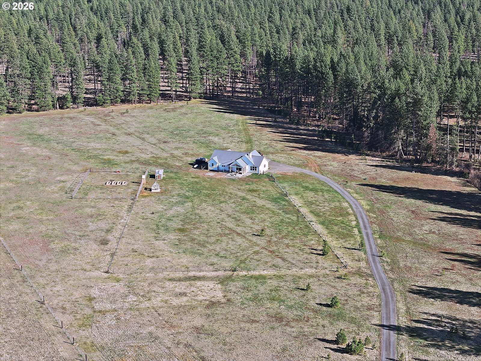 24 Bacon Creek Road Glenwood, WA 98619 - Photo 48 of 48 a view of a yard with large trees