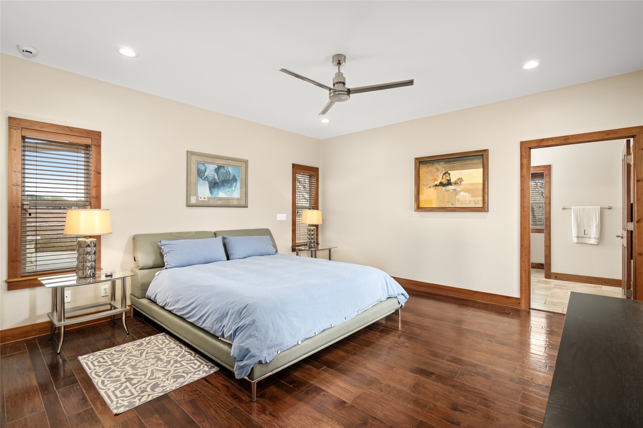 120 State Loop 92 La Grange, TX 78945 - Photo 19 of 50 a bedroom with a large bed and a wooden floor