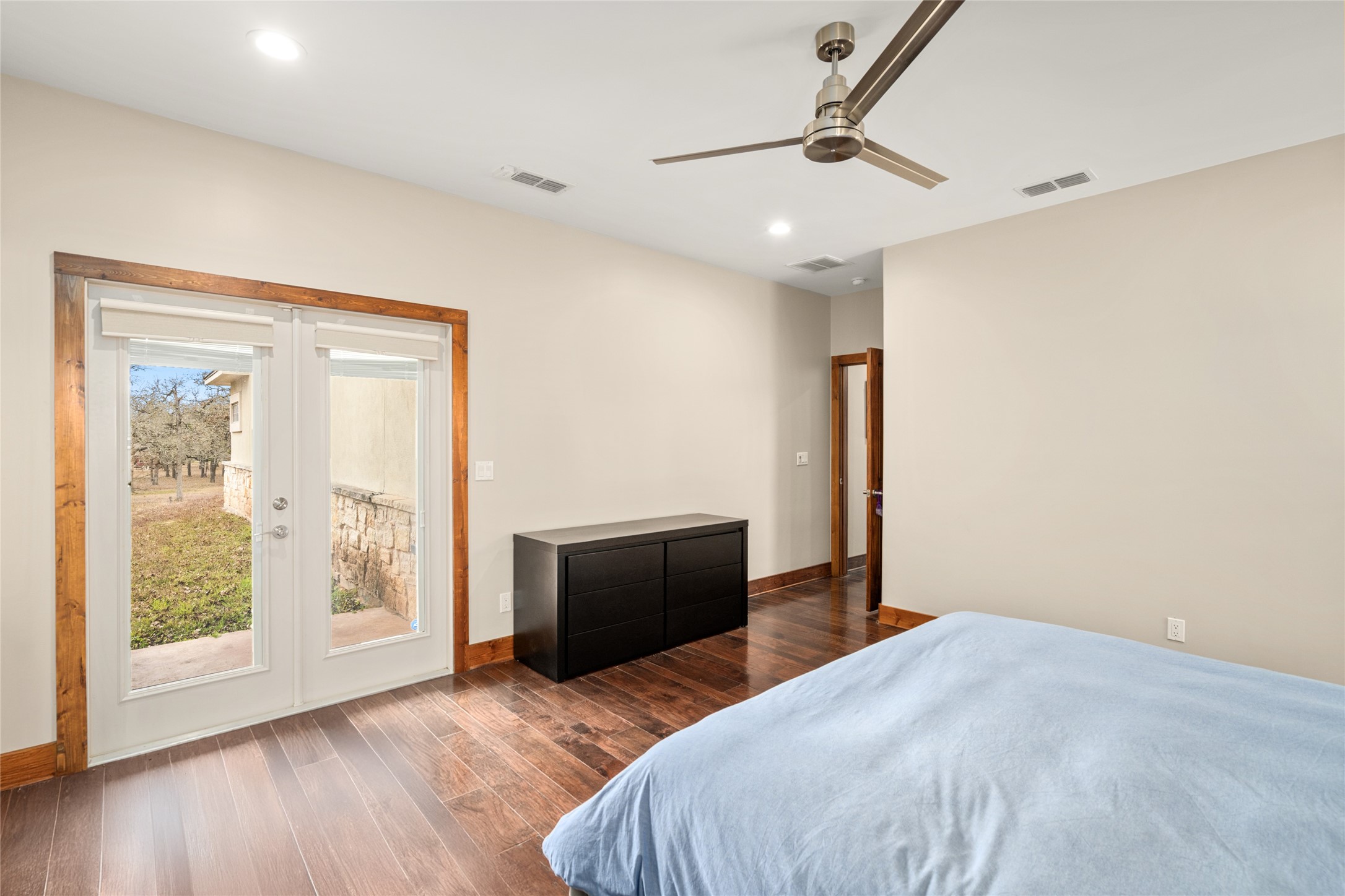 120 State Loop 92 La Grange, TX 78945 - Photo 20 of 50 a bedroom with a bed and wooden floor