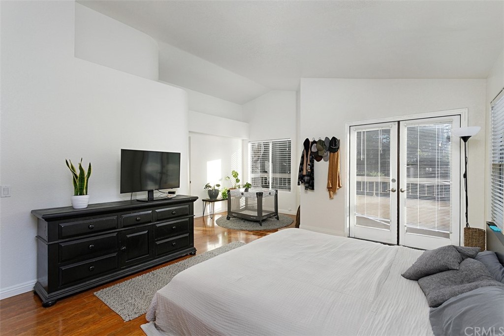 3660 Via Bernardo Oceanside, CA 92056 - Photo 16 of 34 a bedroom with a bed and a flat screen tv