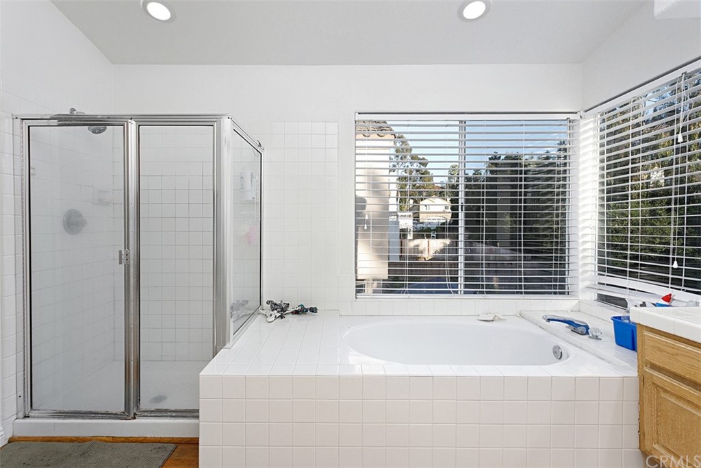 3660 Via Bernardo Oceanside, CA 92056 - Photo 19 of 34 a bathroom with a bathtub and a shower