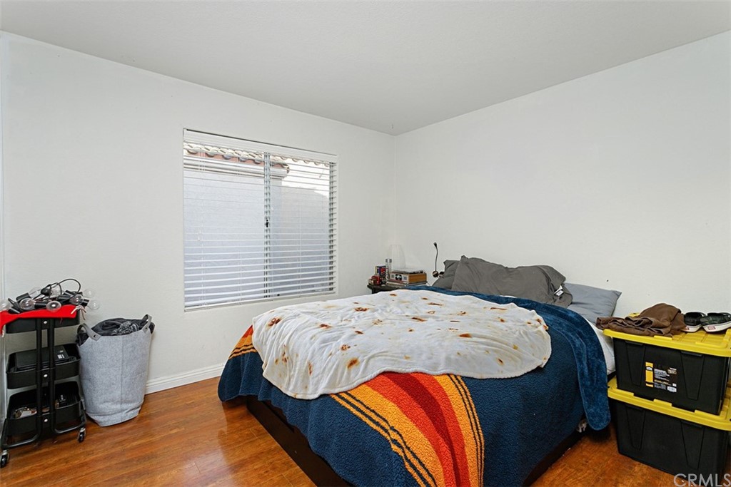 3660 Via Bernardo Oceanside, CA 92056 - Photo 22 of 34 a bedroom with a bed and a window